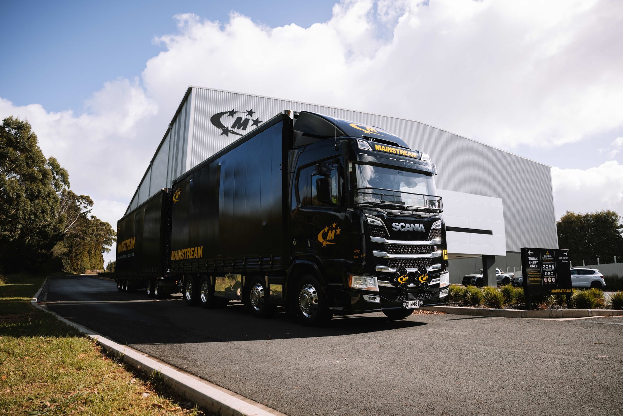 Big Mainstream truck driving out of a Mainstream depot