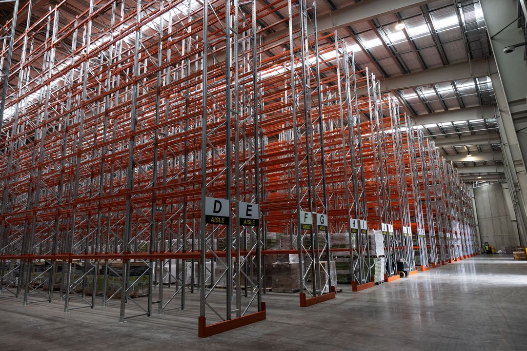 Picture of a warehouse filled to the roof with racking space